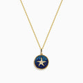 The Seaside 14K Yellow Gold Sapphire and Diamond Starfish Pendant features a round design accented with sapphire and diamond stones on a dark blue background.