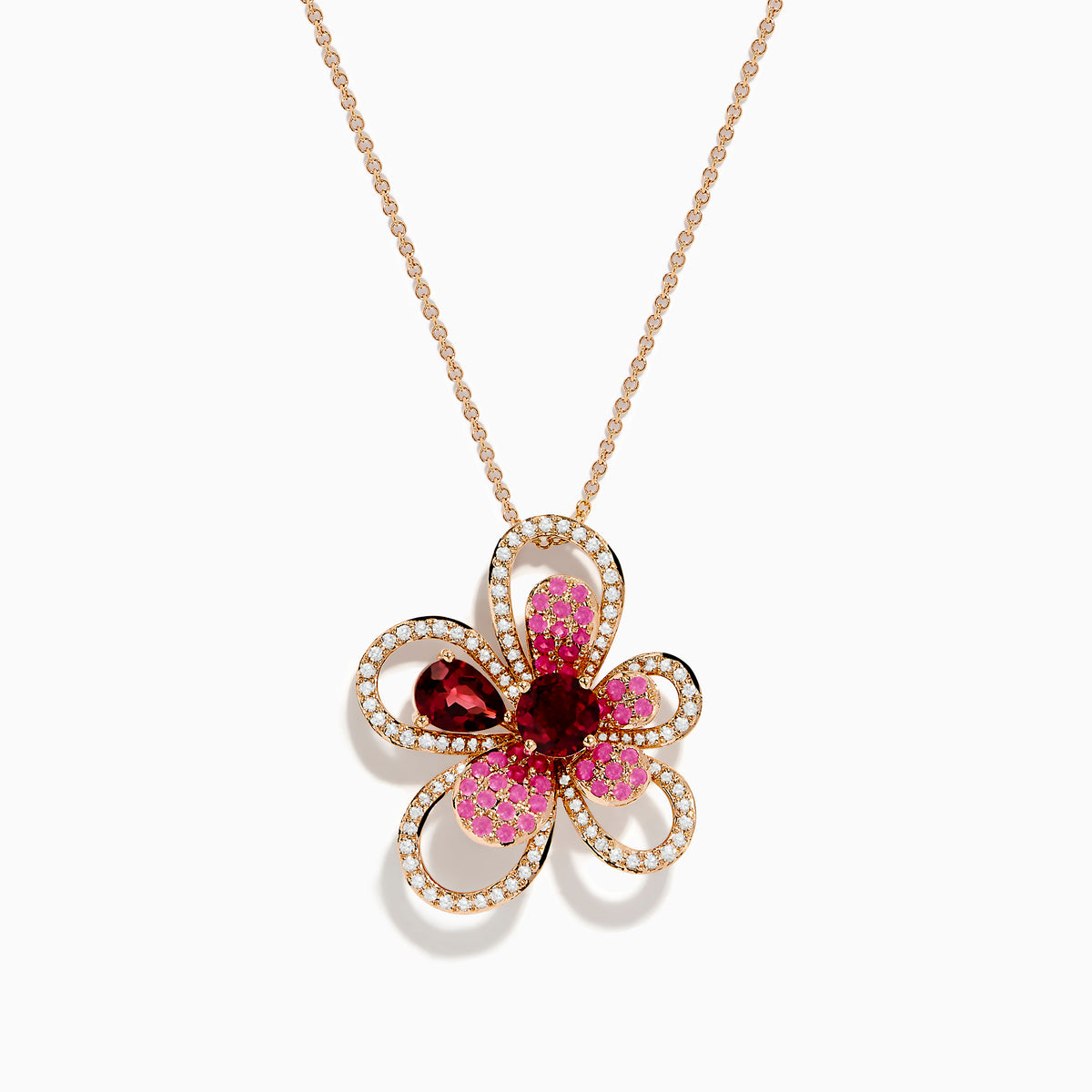 The Nature 14K Rose Gold Rhodolite Pink Sapphire and Diamond Flower Pendant features a central red rhodolite gemstone, surrounded by pink sapphires and diamonds outlining its elegant flower petals.