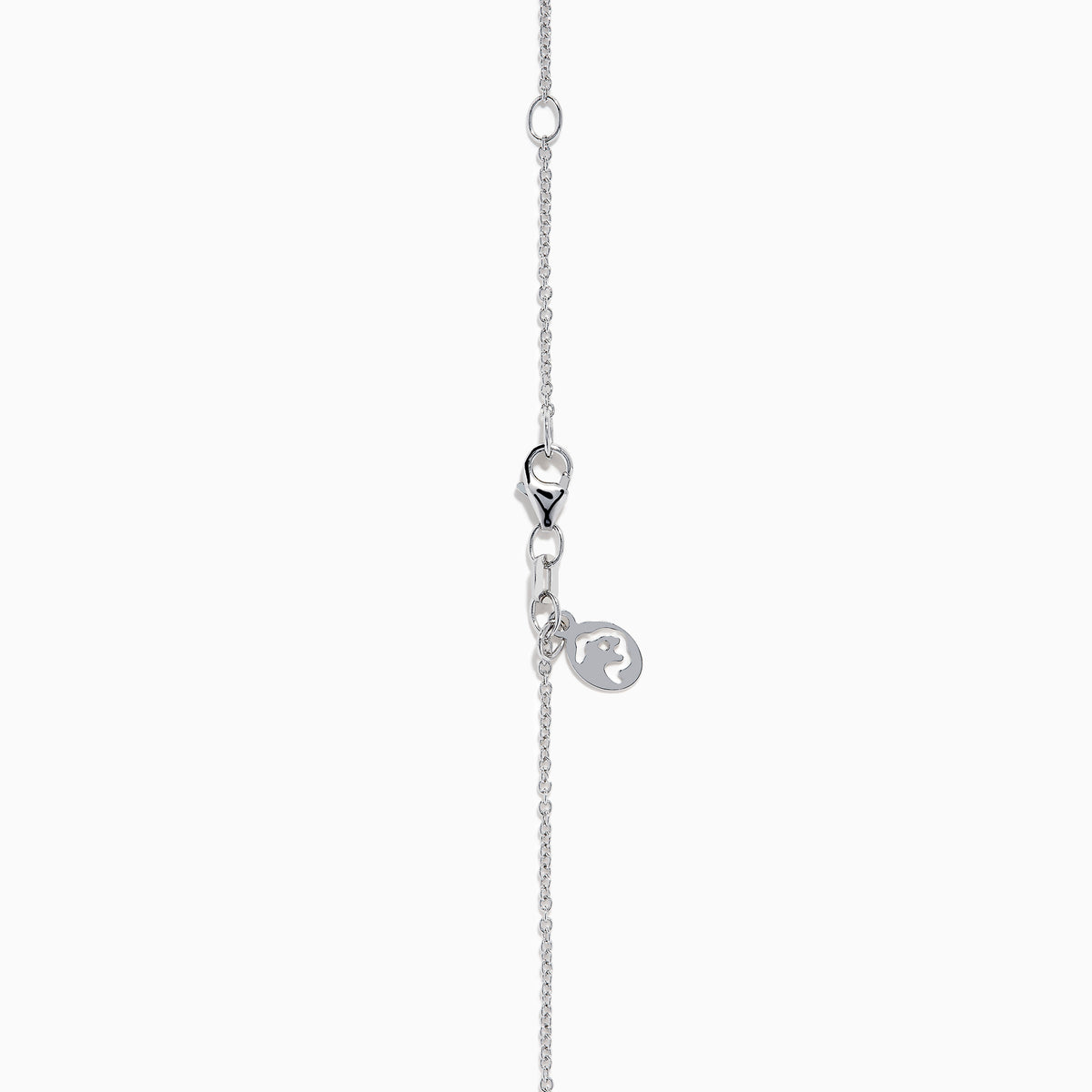 The Novelty 14K White Gold Black and White Diamond Cross Pendant features black stones and a single clear stone at the top, shown on a silver chain against a plain white background.