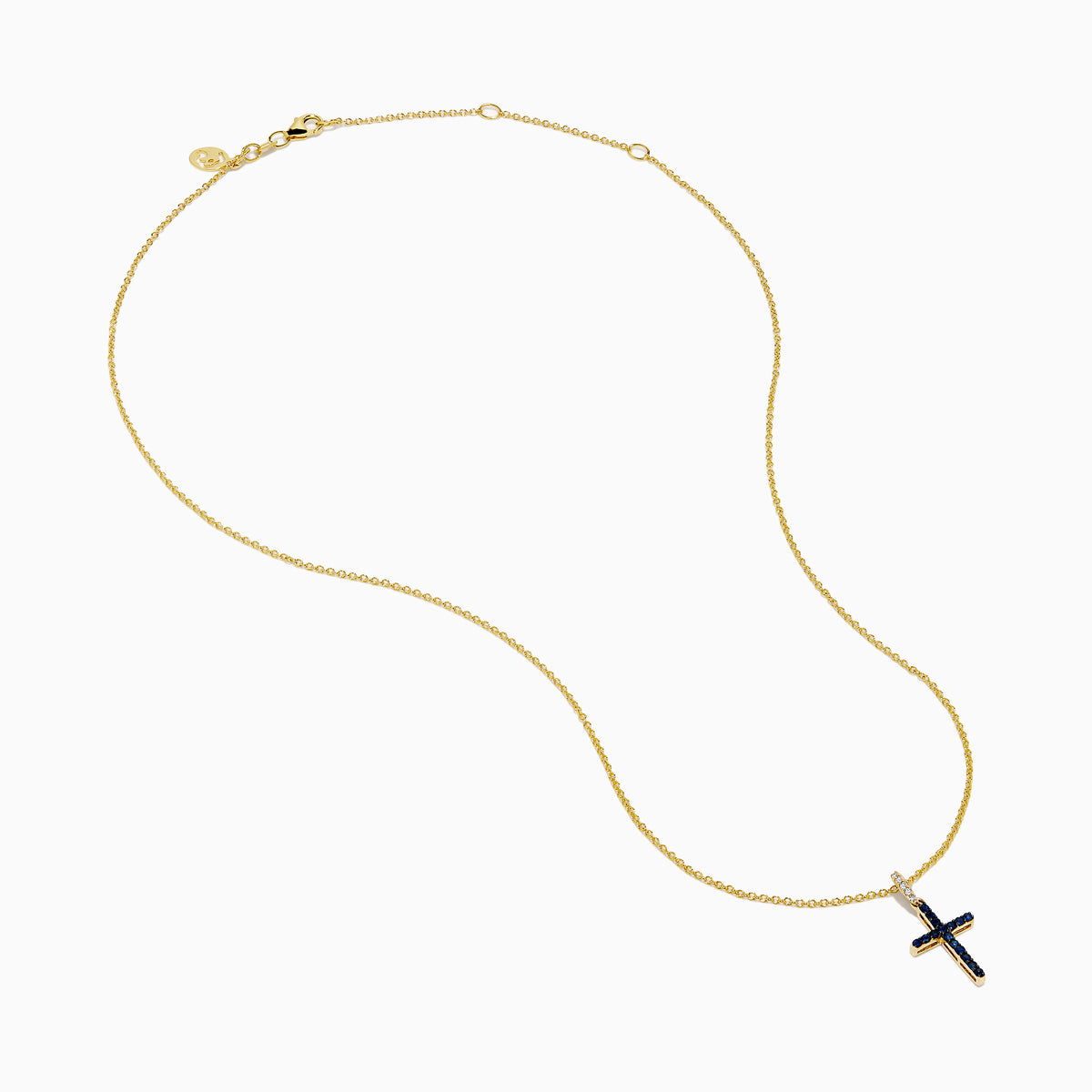 The Novelty 14K Yellow Gold Sapphire and Diamond Cross Pendant features a cross adorned with sapphires and sparkling diamonds, shown on a plain white background.