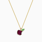 Discover the Novelty 14K Yellow Gold Ruby, Tsavorite and Diamond Apple Pendant—an elegant chain necklace with an apple-shaped pendant accented by vivid rubies, sparkling diamonds, and a green tsavorite leaf.