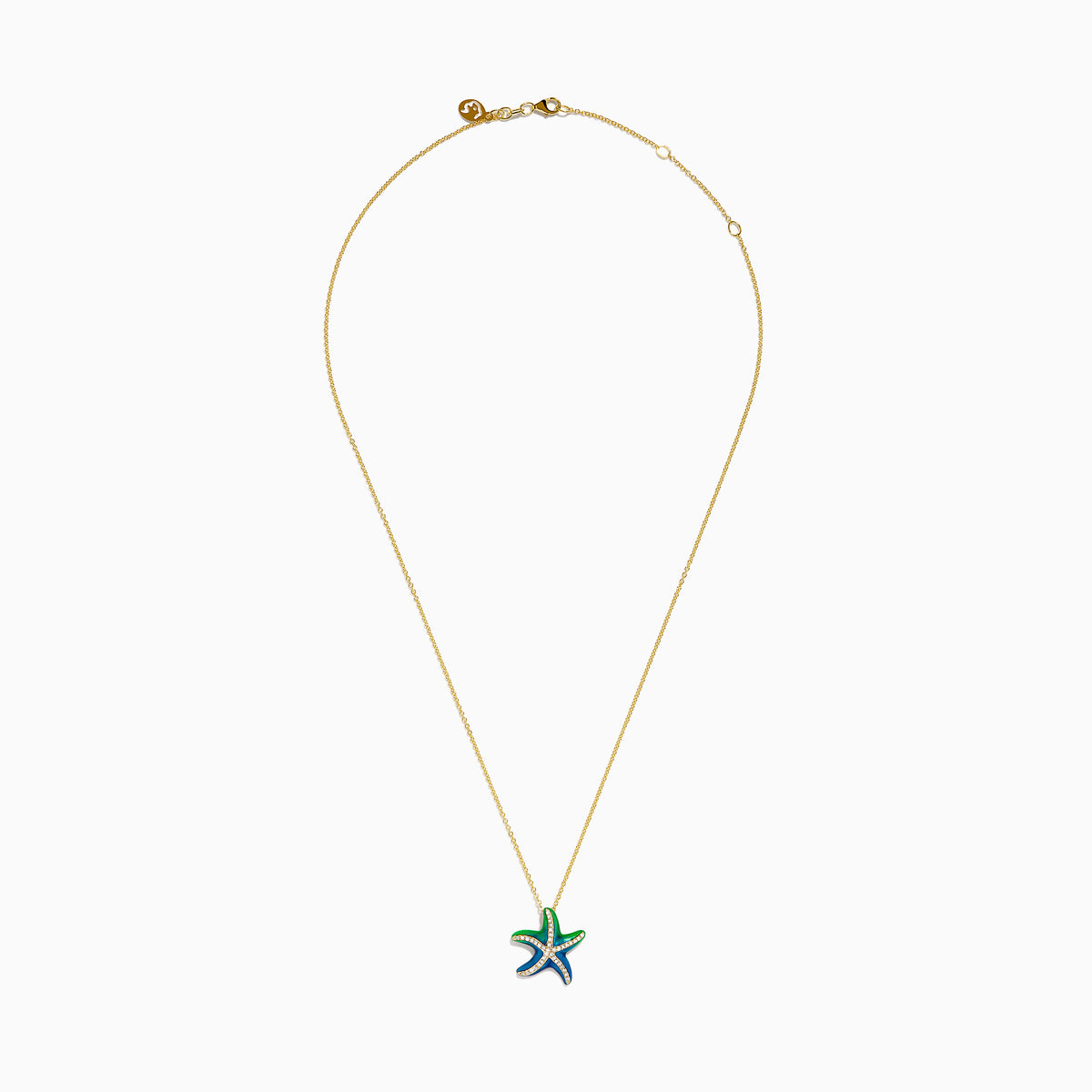 The 14K Yellow Gold Diamond and Enamel Starfish Pendant features green and blue enamel sections on each arm, accented by white diamonds, hanging from a yellow gold chain against a plain white background.