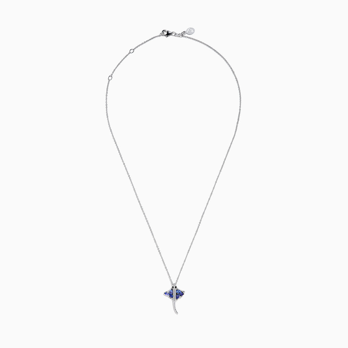 The Seaside 925 Silver Tanzanite and Diamond Stingray Pendant features a stingray design set with blue tanzanite and sparkling white diamonds.