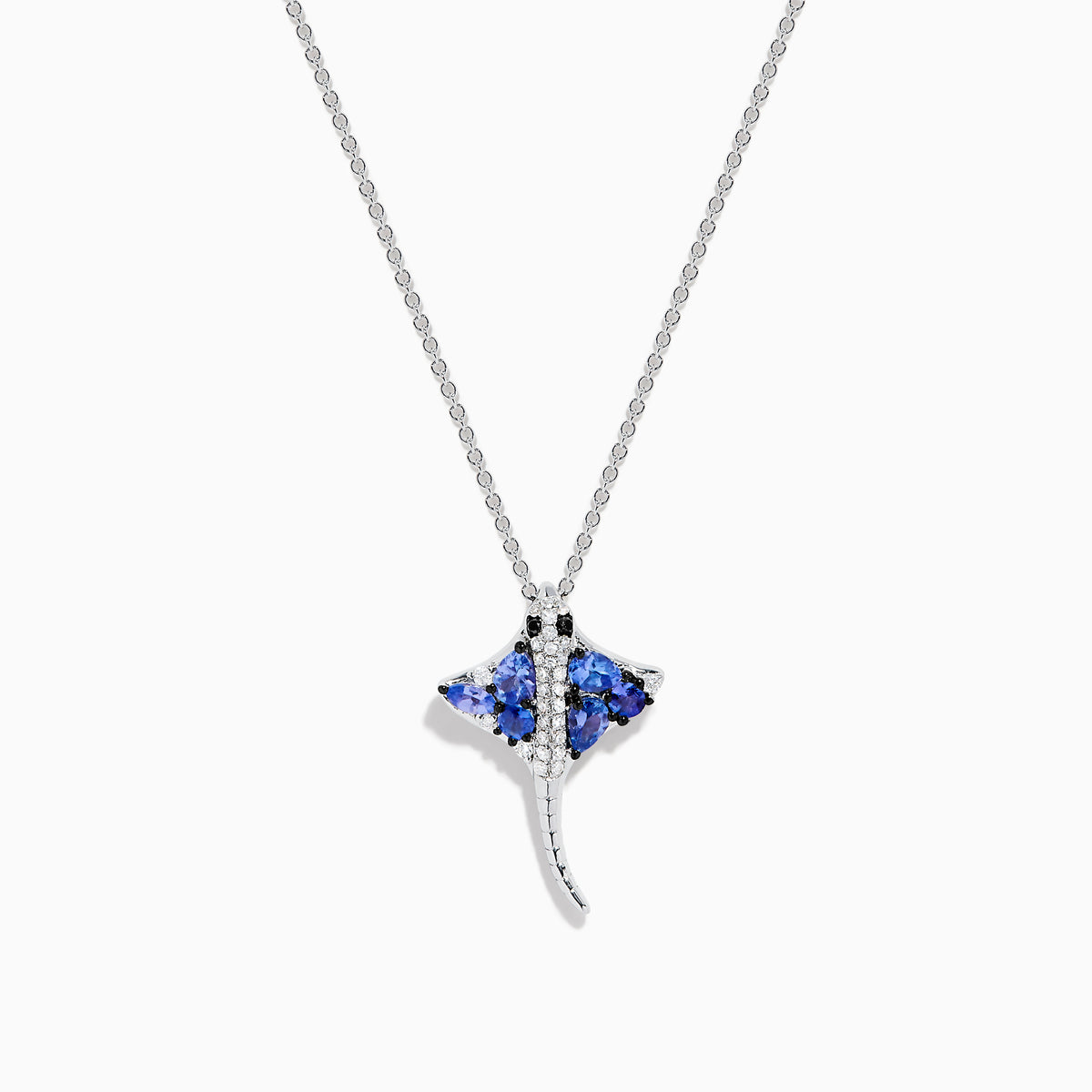 The Seaside 925 Silver Tanzanite and Diamond Stingray Pendant features a stingray design set with blue tanzanite and sparkling white diamonds.