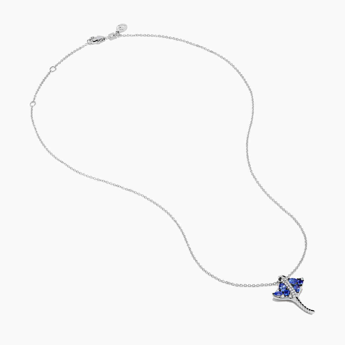 The Seaside 925 Silver Tanzanite and Diamond Stingray Pendant features a stingray design set with blue tanzanite and sparkling white diamonds.