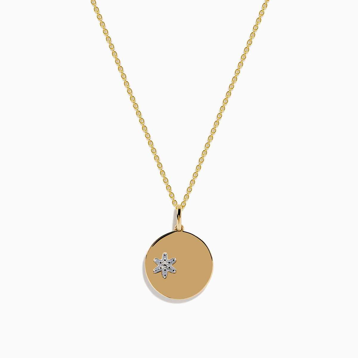 The Watercolors 14K Two Tone Gold Multi Sapphire and Diamond Star Burst Pendant features a central diamond, sapphire accents on one side, and hangs from a delicate two tone gold chain.