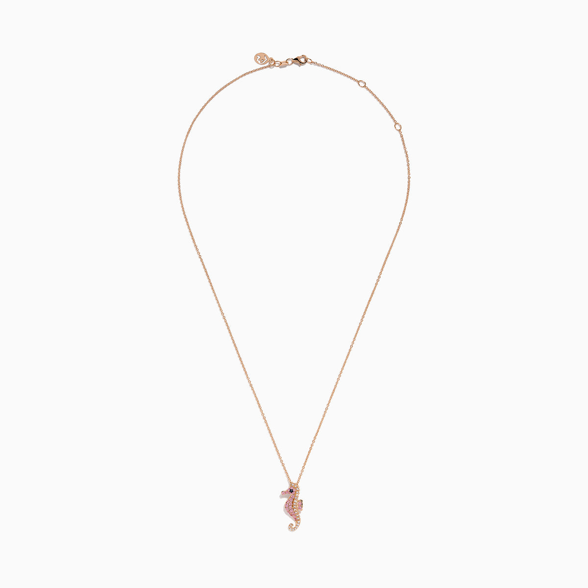 The 14K Rose Gold Pink Sapphire and Diamond Pave Seahorse Pendant features pink sapphires, diamond accents, and a small black gemstone eye, all set in rose gold and displayed against a white background.