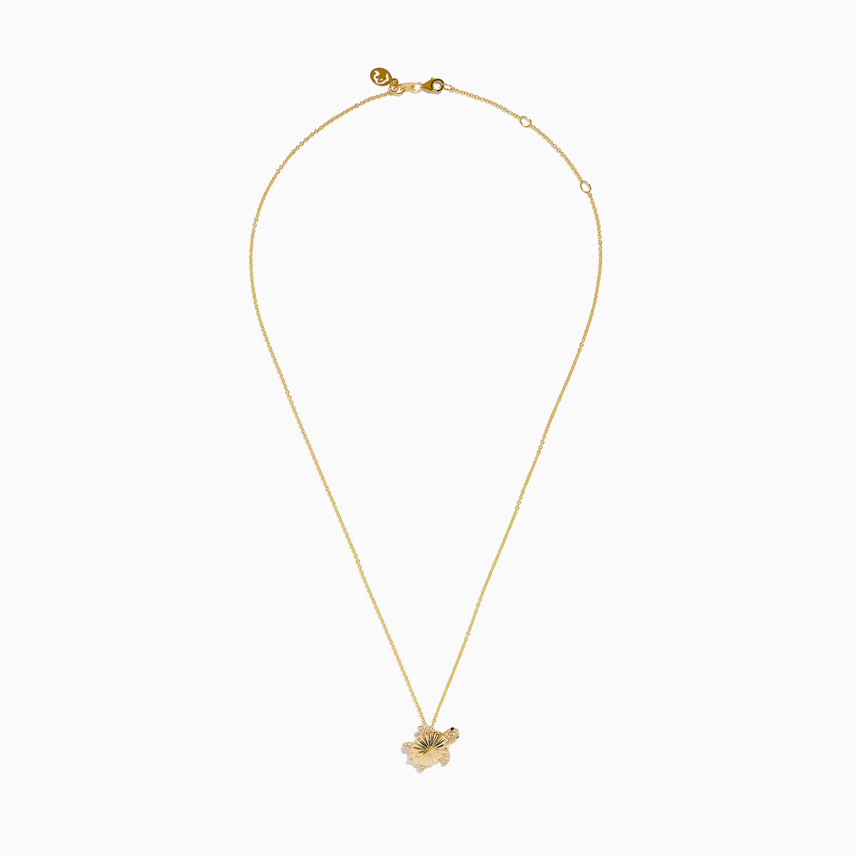 The 14K Yellow Gold Diamond Fluted Shell Turtle Pendant features a turtle-shaped design with fluted shell detailing and sparkling diamond accents, shown against a white background.