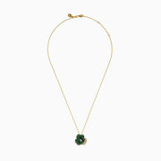 The 14K Yellow Gold Tsavorite and Diamond Flower Pendant features a floral design with one petal set with diamonds and the others adorned with vibrant green tsavorites.