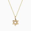 Novelty 14K Yellow Gold Star of David Diamond Pendant displayed on a gold chain, featuring sparkling diamonds set along the edges of the star, shown against a plain white background.