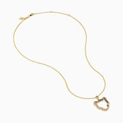 The Signature 14K Yellow Gold Diamond Panther Silhouette Pendant features a minimalist open panther design on a chain, accented with small white gemstones along the edges.