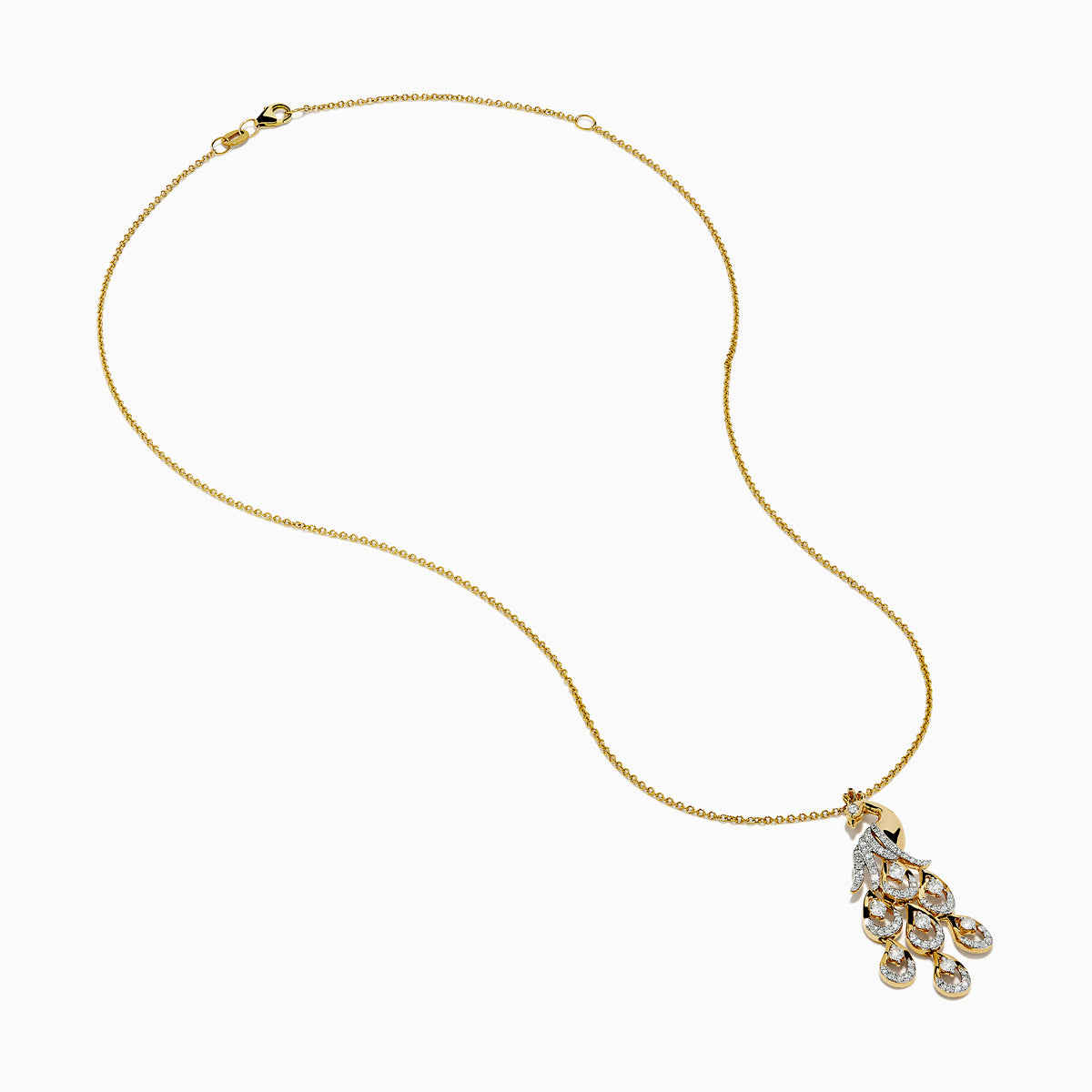 The Safari 14K Yellow Gold Diamond Peacock Pendant features an intricately detailed peacock with diamond-adorned tail feathers, suspended from a 14K yellow gold chain, shown on a white background.