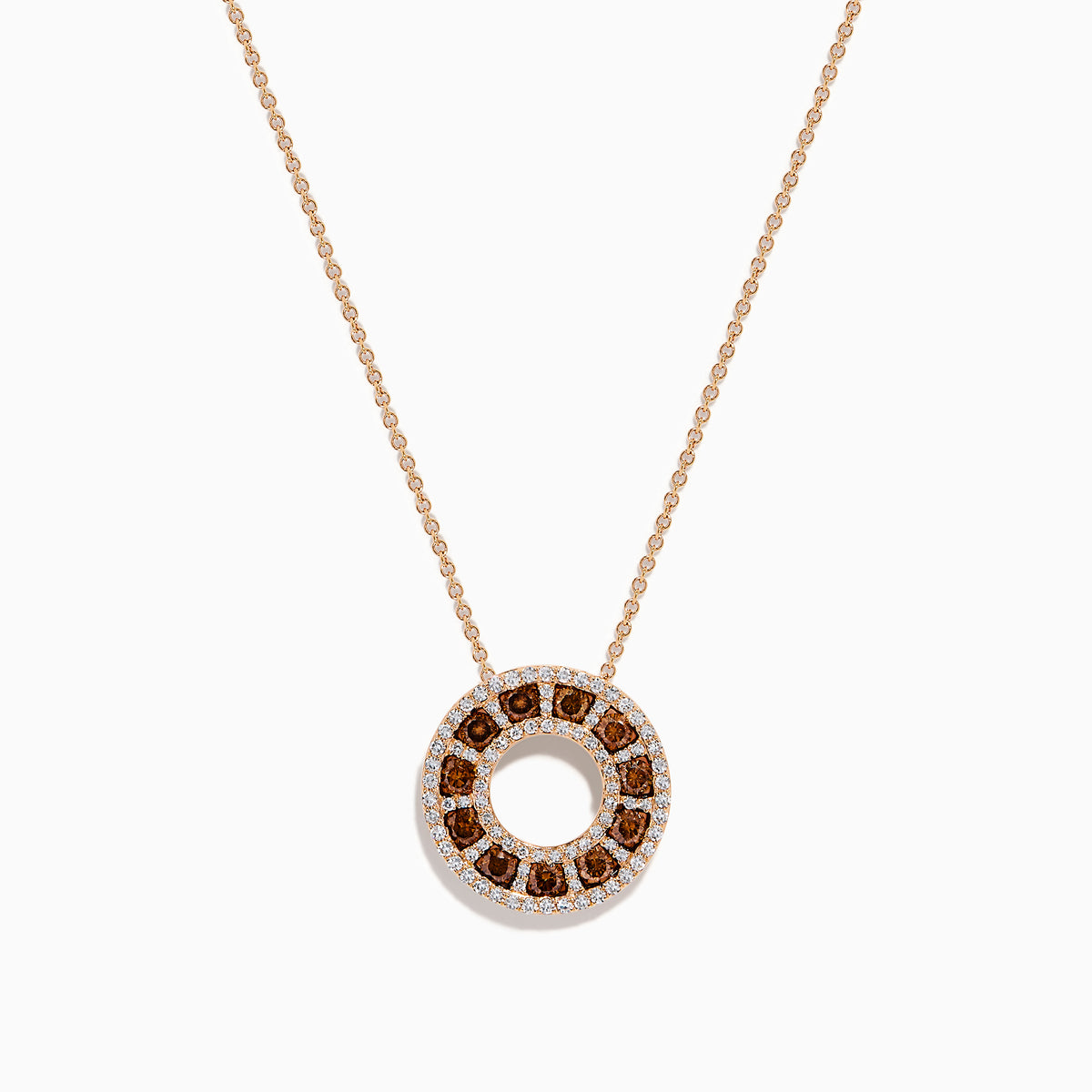 The 14K Rose Gold Brown and White Diamond Circle Pendant features alternating brown and white diamonds in a circle on a delicate gold chain, displayed against a white background.