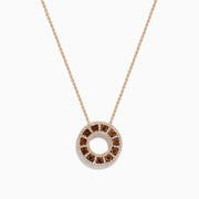 The 14K Rose Gold Brown and White Diamond Circle Pendant features alternating brown and white diamonds in a circle on a delicate gold chain, displayed against a white background.