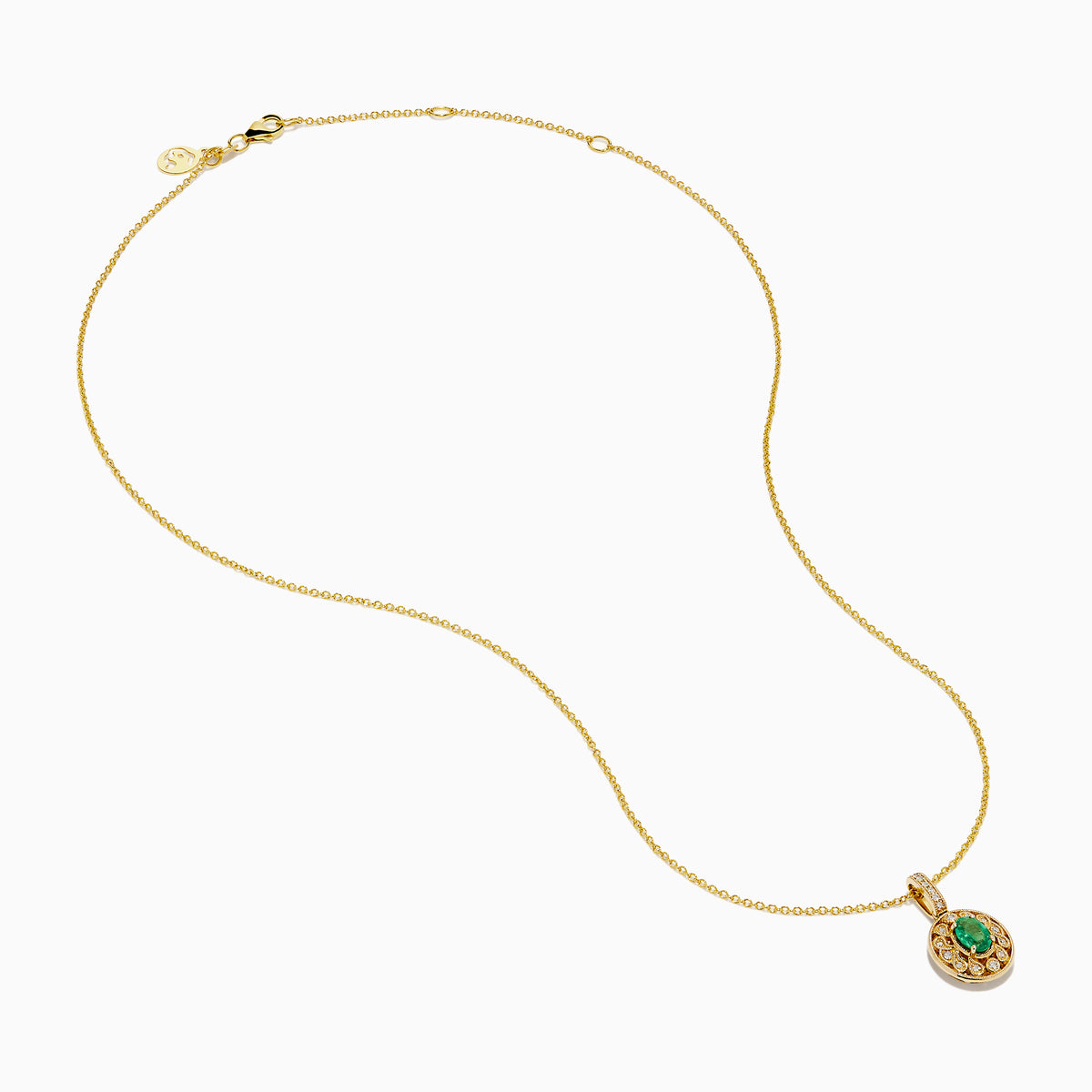 The 14K Yellow Gold Emerald and Diamond Filigree Halo Pendant features an elegant oval green emerald encircled by sparkling diamonds, with additional diamond accents on the bail for added brilliance.