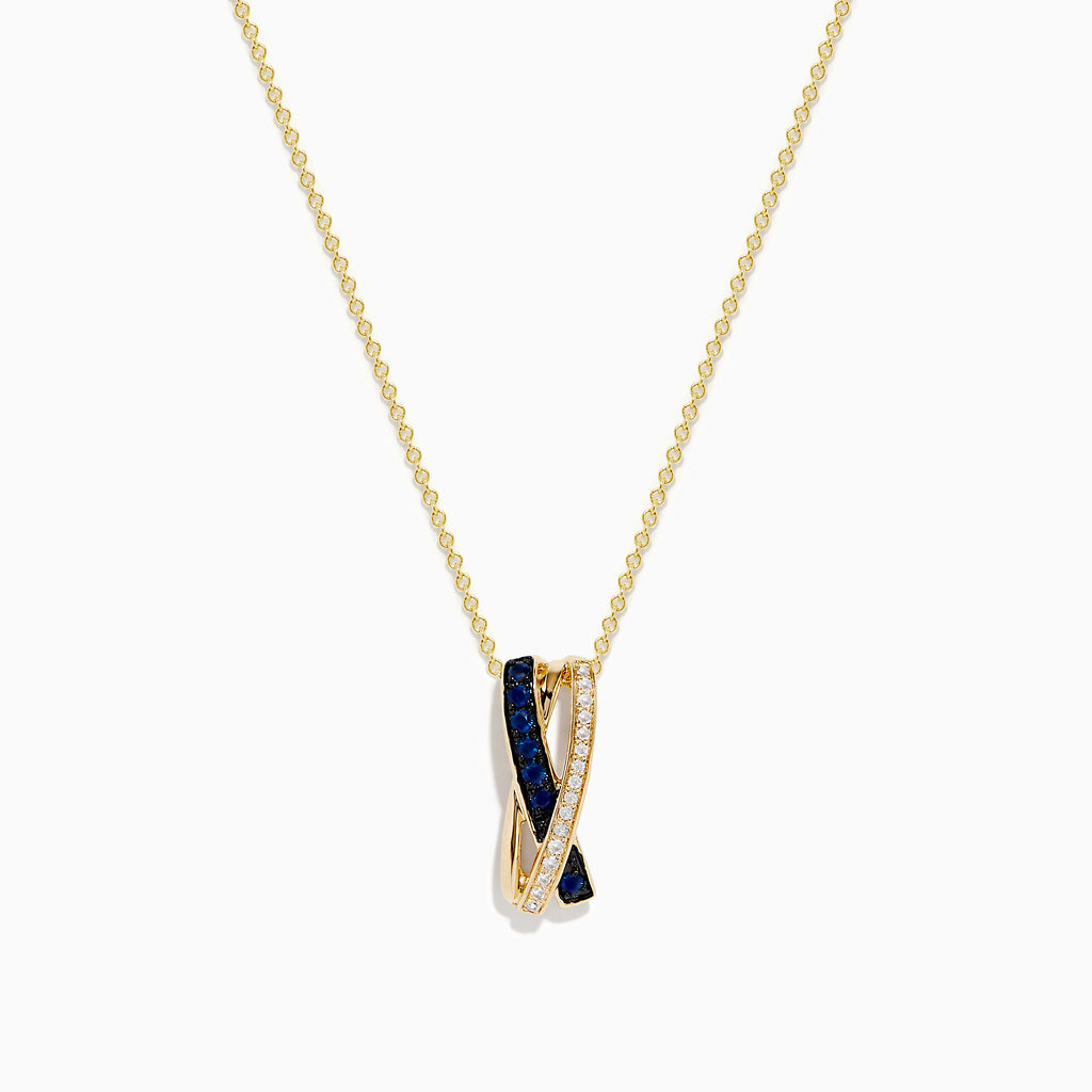 The Royale Bleu 14K Yellow Gold Pendant showcases an intertwined design with a blue sapphire band and a diamond-encrusted band, set on a gold chain, elegantly displayed against a white background.