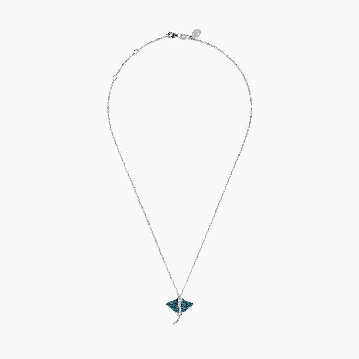 The Seaside Bella Bleu 14K White Gold Blue and White Diamond Sting Ray Pendant features sparkling blue and white diamonds on a delicate chain, displayed against a white background.