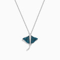 The Seaside Bella Bleu 14K White Gold Blue and White Diamond Sting Ray Pendant features sparkling blue and white diamonds on a delicate chain, displayed against a white background.