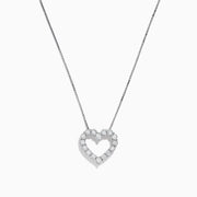 The 925 Sterling Silver Diamond Heart Pendant features a delicate heart design encrusted with sparkling diamonds, elegantly displayed against a white background.