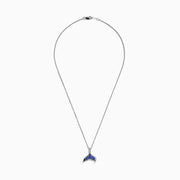 The 925 Silver Tanzanite and Diamond Whale Tail Pendant features a whale tail design with blue tanzanite gemstones and sparkling diamonds, crafted in 925 silver for a stunning shine against a white background.