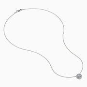 The 14K White Gold Diamond Bezel Halo Pendant features a delicate white gold chain with a round, flower-like diamond pendant, showcasing a central diamond surrounded by a halo of smaller diamonds.