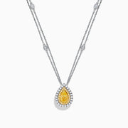 The 18K Two Toned White & Yellow Diamond Layered Doble Halo Pendant features a double-strand silver necklace with a pear-shaped yellow gemstone, diamond halos, and additional round diamonds on layered chains.