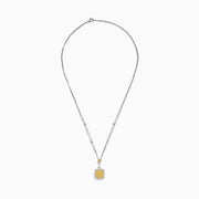 The Canare 18K Two Tone Gold Pendant features a double chain and a square pendant with yellow diamonds in the center, clear stones around, plus extra stones on the chain and bail.