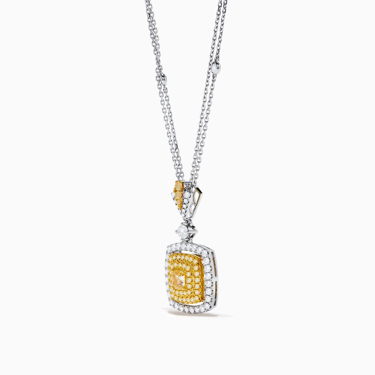 The Canare 18K Two Tone Gold Pendant features a double chain and a square pendant with yellow diamonds in the center, clear stones around, plus extra stones on the chain and bail.