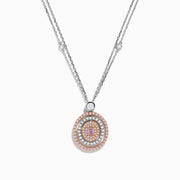 The 18K Two Tone Gold White and Pink Diamond Pendant necklace features a double-chain design with a round pendant of concentric circles, set with white and pink diamonds and topped by a single white gemstone.