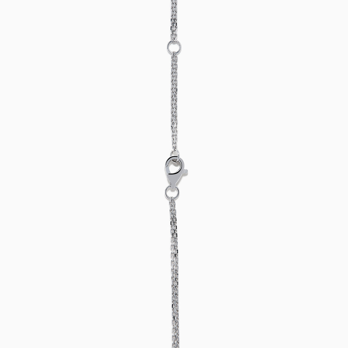 The 18K Two Tone Gold White and Pink Diamond Pendant necklace features a double-chain design with a round pendant of concentric circles, set with white and pink diamonds and topped by a single white gemstone.