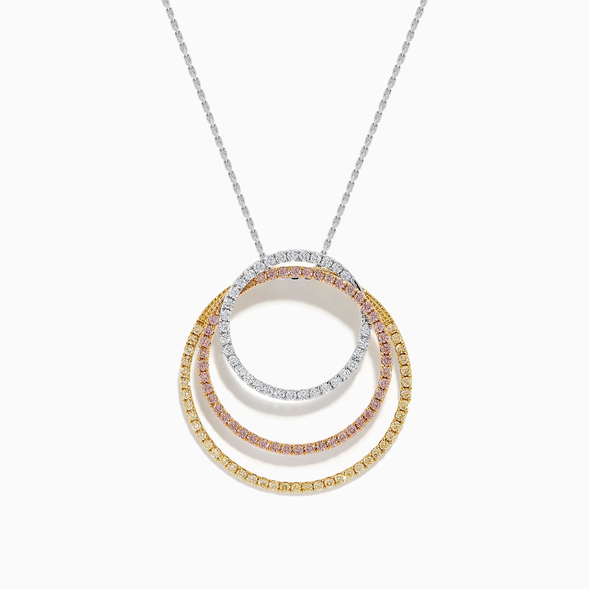 The 18K Gold Pink, Yellow and White Diamond Circles Pendant features three interlocking rings in tri-color gold with pink, yellow, and white diamonds on a silver chain against a white background.