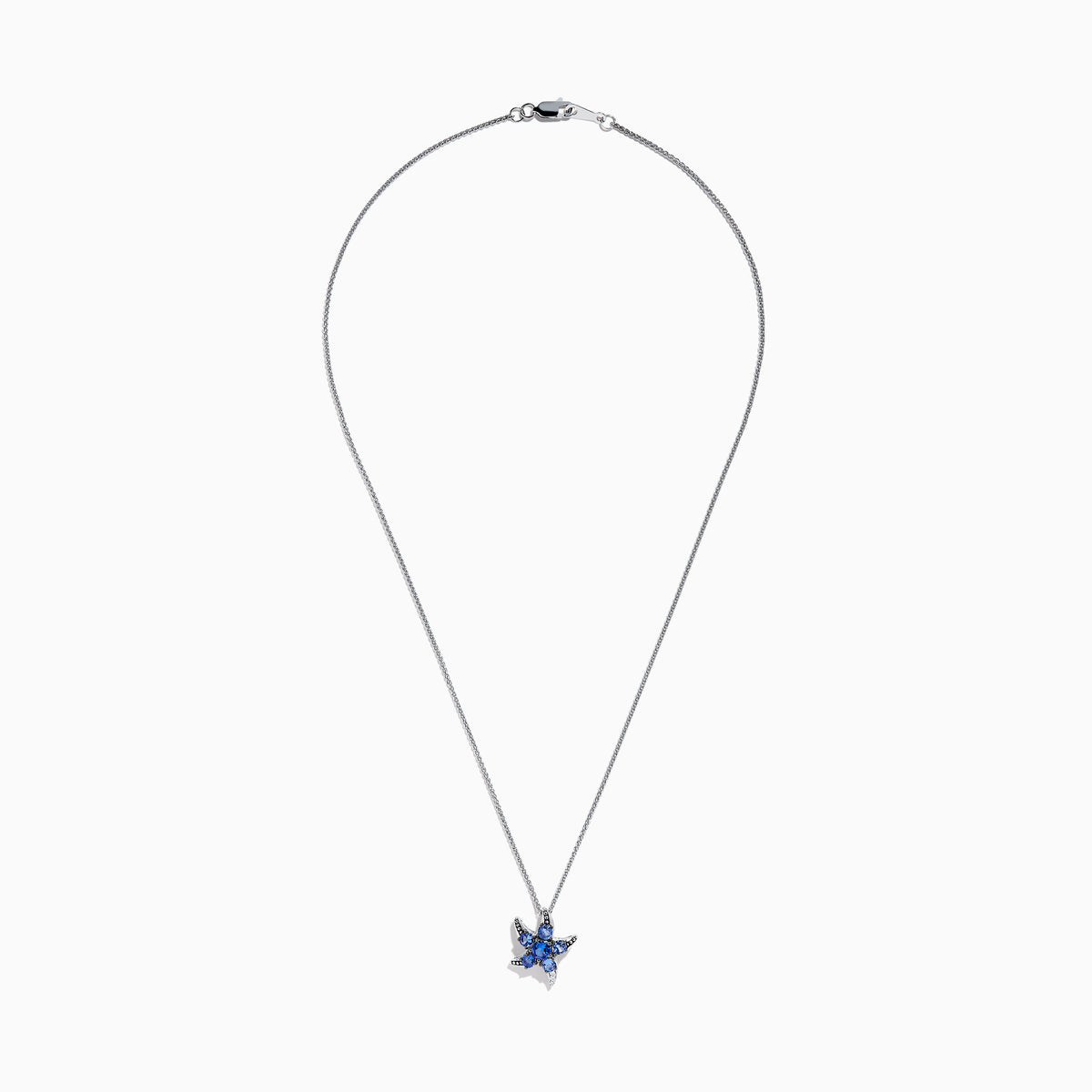 The 925 Silver Tanzanite and Diamond Starfish Pendant features five tanzanite gemstones and sparkling diamonds on the tips, showcased against a white background.