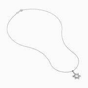 The 925 Sterling Silver Diamond Star of David Pendant is showcased on a silver chain, elegantly displayed against a white background.
