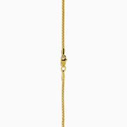 The Men's 14K Yellow Gold Onyx and Diamond Panther Dog Tag Pendant features a rectangular onyx accented with diamonds and a gold panther head set against a black background.