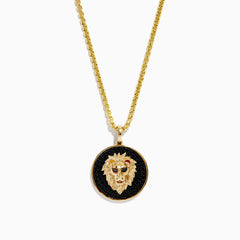 The Mens 14K Yellow Gold Black Diamond Lion Head Pendant features a detailed lion head on a black textured background, red eyes, and hangs from a shiny medium-thick chain for an impressive look.