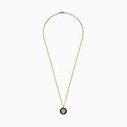 Mens 14K Yellow Gold Black Diamond Lion Pendant features a detailed lion head on a black background, set in a circular gold frame for bold elegance.