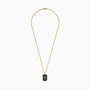 Mens 14K Yellow Gold Cross Pendant featuring a raised cross design accented with black sapphires and sparkling diamonds.
