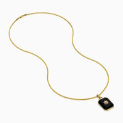 A 14K yellow gold agate and diamond pendant necklace with a rectangular black agate, gold starburst design, and a small central diamond, shown on a plain white background.