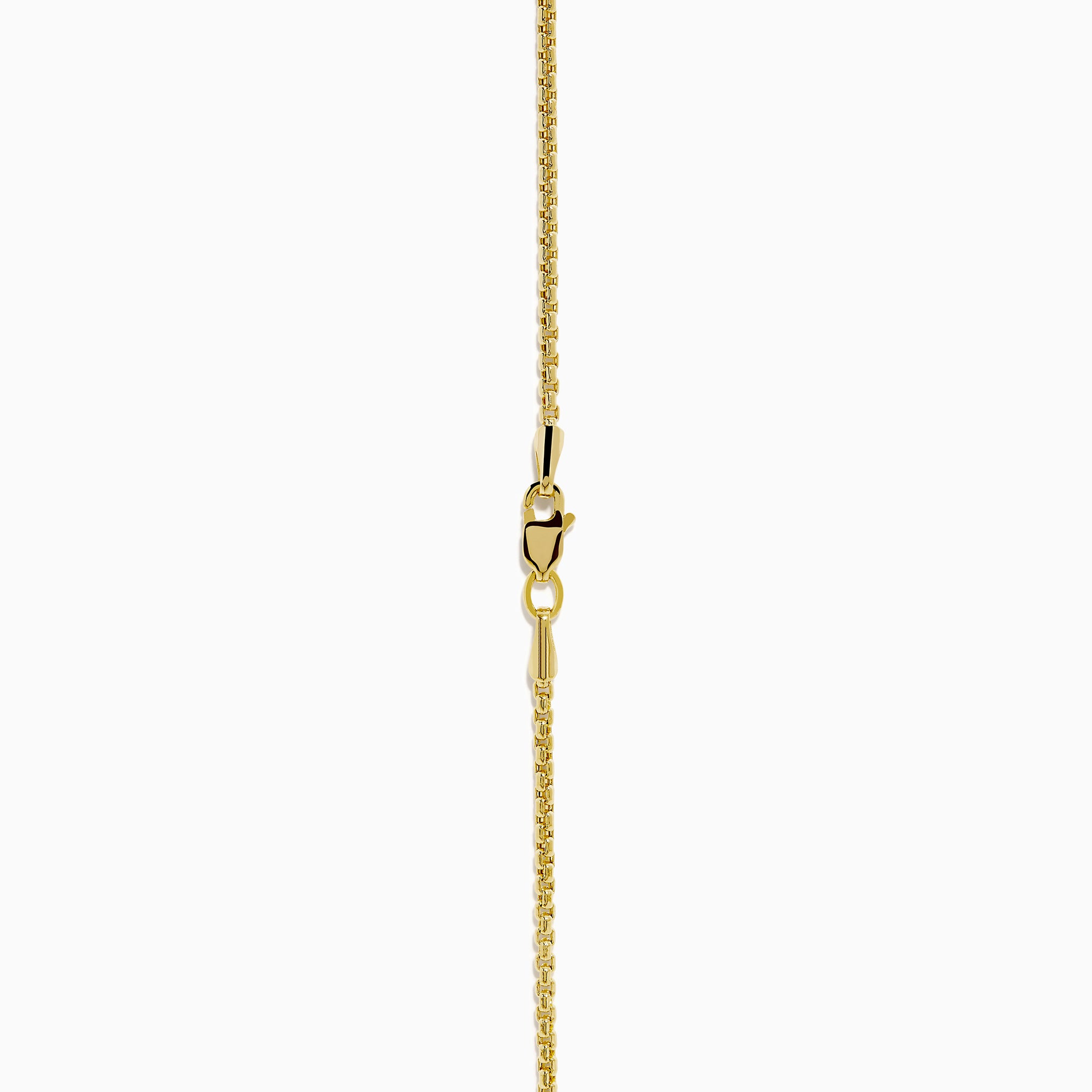 A 14K yellow gold agate and diamond pendant necklace with a rectangular black agate, gold starburst design, and a small central diamond, shown on a plain white background.