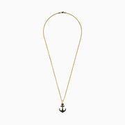 The Men's 14K Yellow Gold Black Diamond Anchor Pendant features a yellow gold chain and an anchor-shaped pendant adorned with small black diamonds, geometric details at the top, and pointed arrow-like ends.