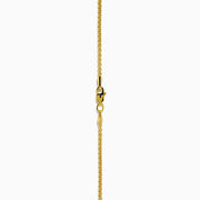 The Men's 14K Yellow Gold Black Diamond Anchor Pendant features a yellow gold chain and an anchor-shaped pendant adorned with small black diamonds, geometric details at the top, and pointed arrow-like ends.