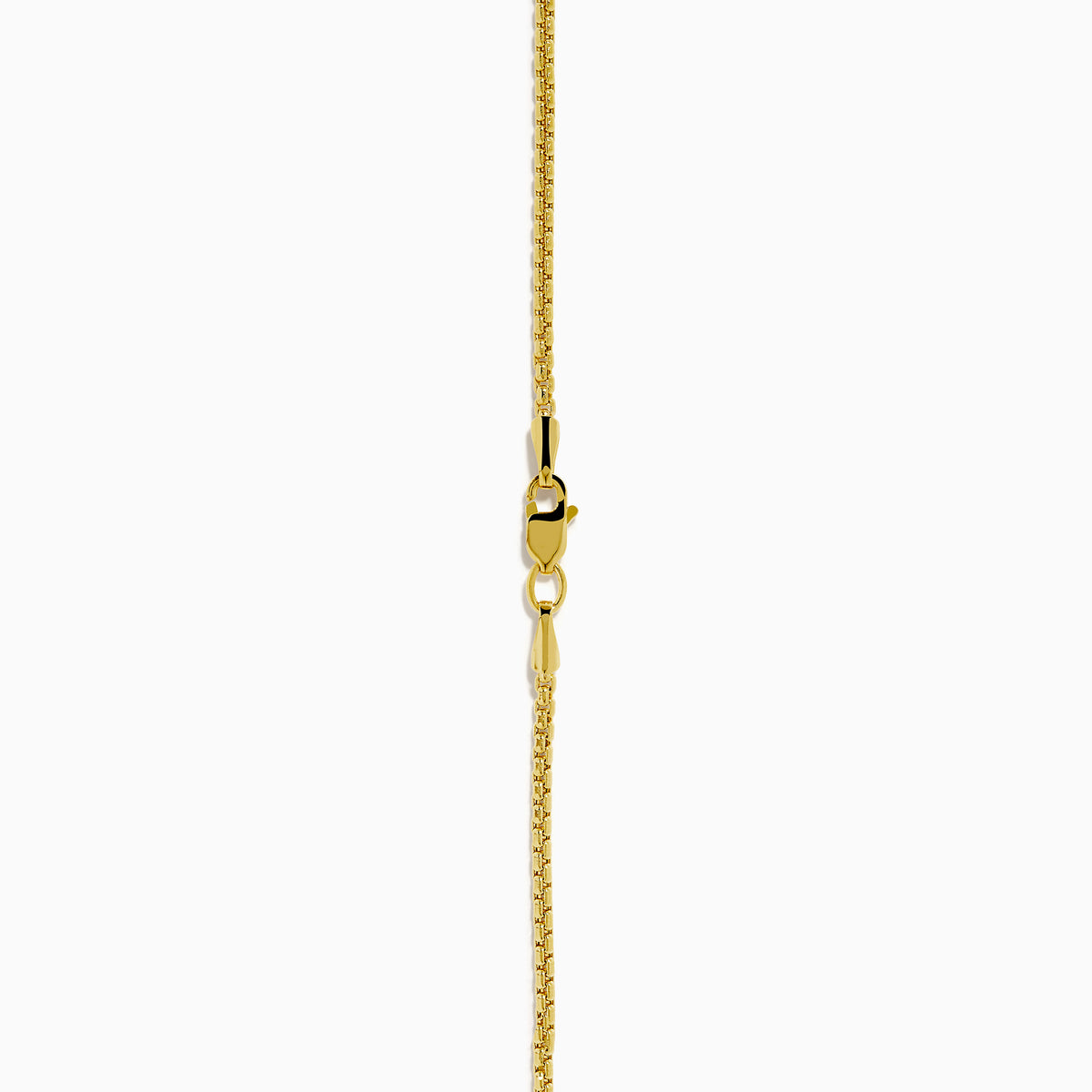 This men's 14K yellow gold necklace features a whales tail pendant accented with blue diamonds on each fin. Both the chain and pendant have a shiny, polished finish.