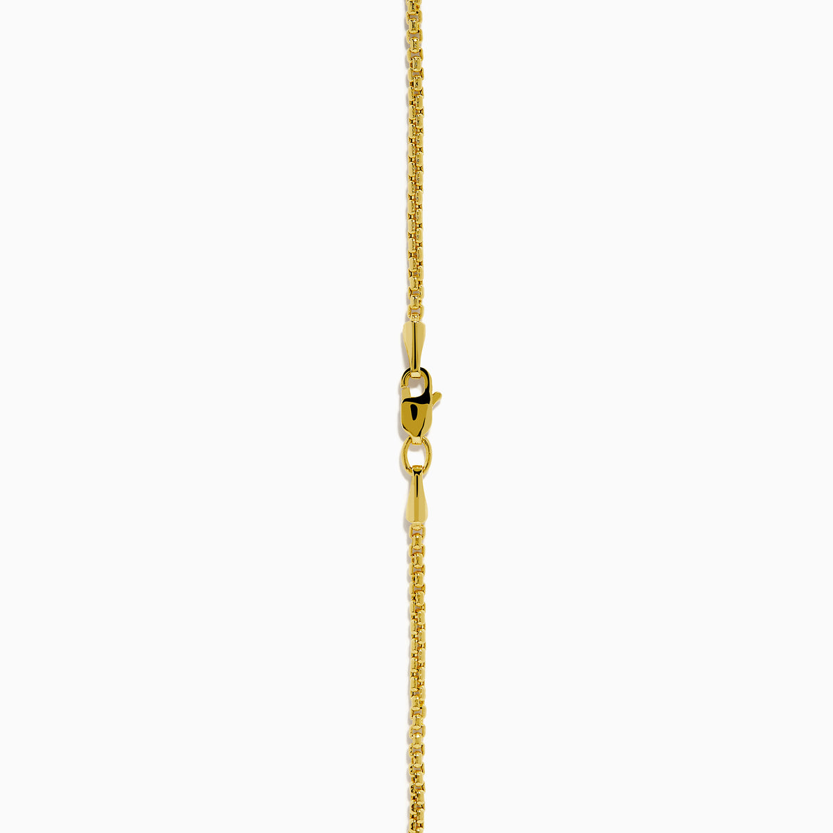 This men's 14K yellow gold dog tag pendant features black onyx, black diamonds, and a modern geometric design with chamfered corners.