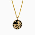 Men's 14K Yellow Gold Onyx and Diamond Dragon Pendant features a raised gold dragon on black onyx, bordered with sparkling diamonds.