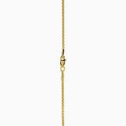 The Men's 14K Yellow Malachite and Diamond Dog Tag Pendant features a rectangular green malachite center bordered by diamonds, hanging from a gold chain—an elegant accessory with timeless appeal.