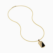 The Men's 14K Yellow Gold Onyx and Diamond Dog Tag Pendant features a rectangular design with diagonal gold and black onyx sections, separated by dazzling diamonds for a bold, modern look.