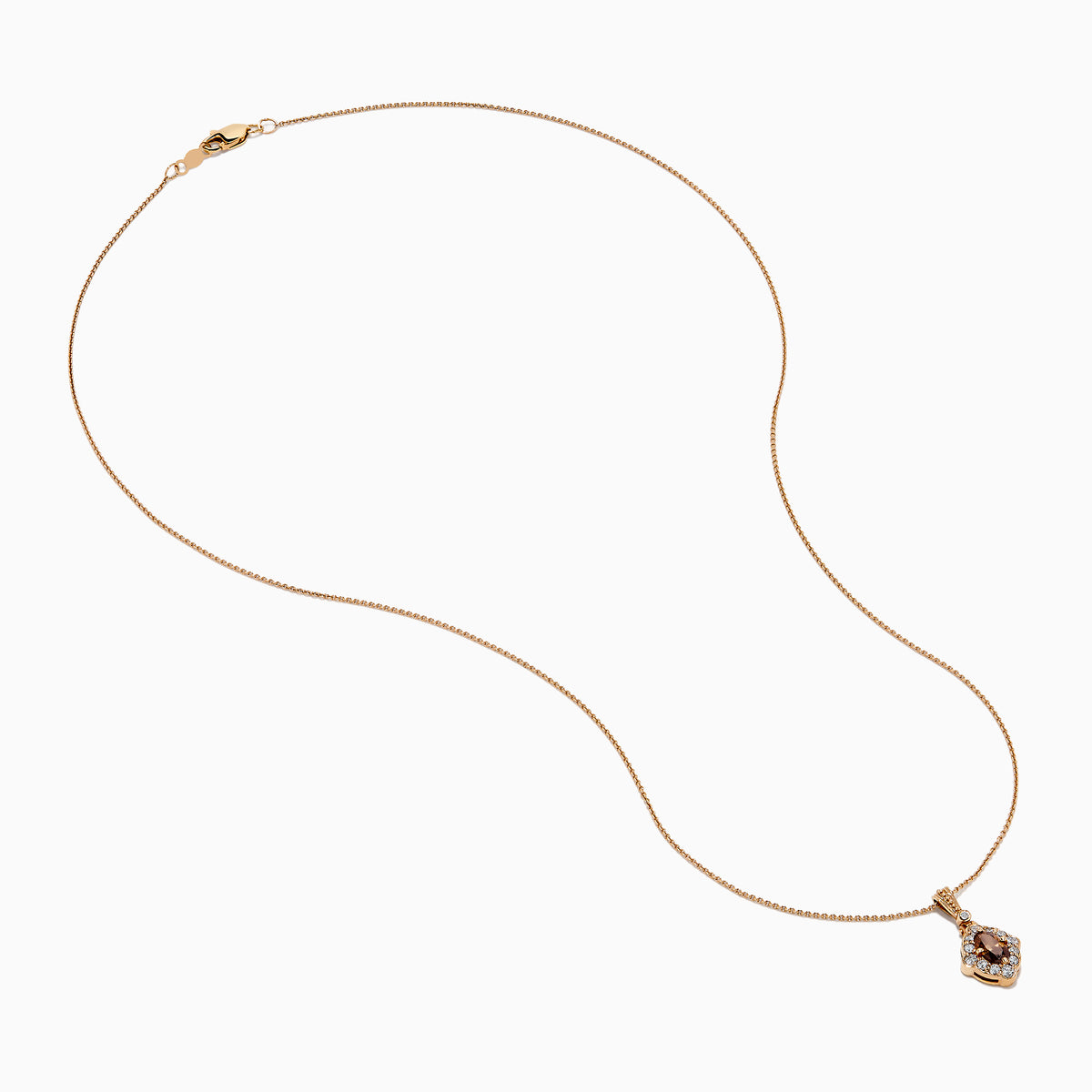 The 14K Rose Gold Brown and White Diamond Halo Pendant features an oval brown and white diamond surrounded by small clear stones in a decorative setting.