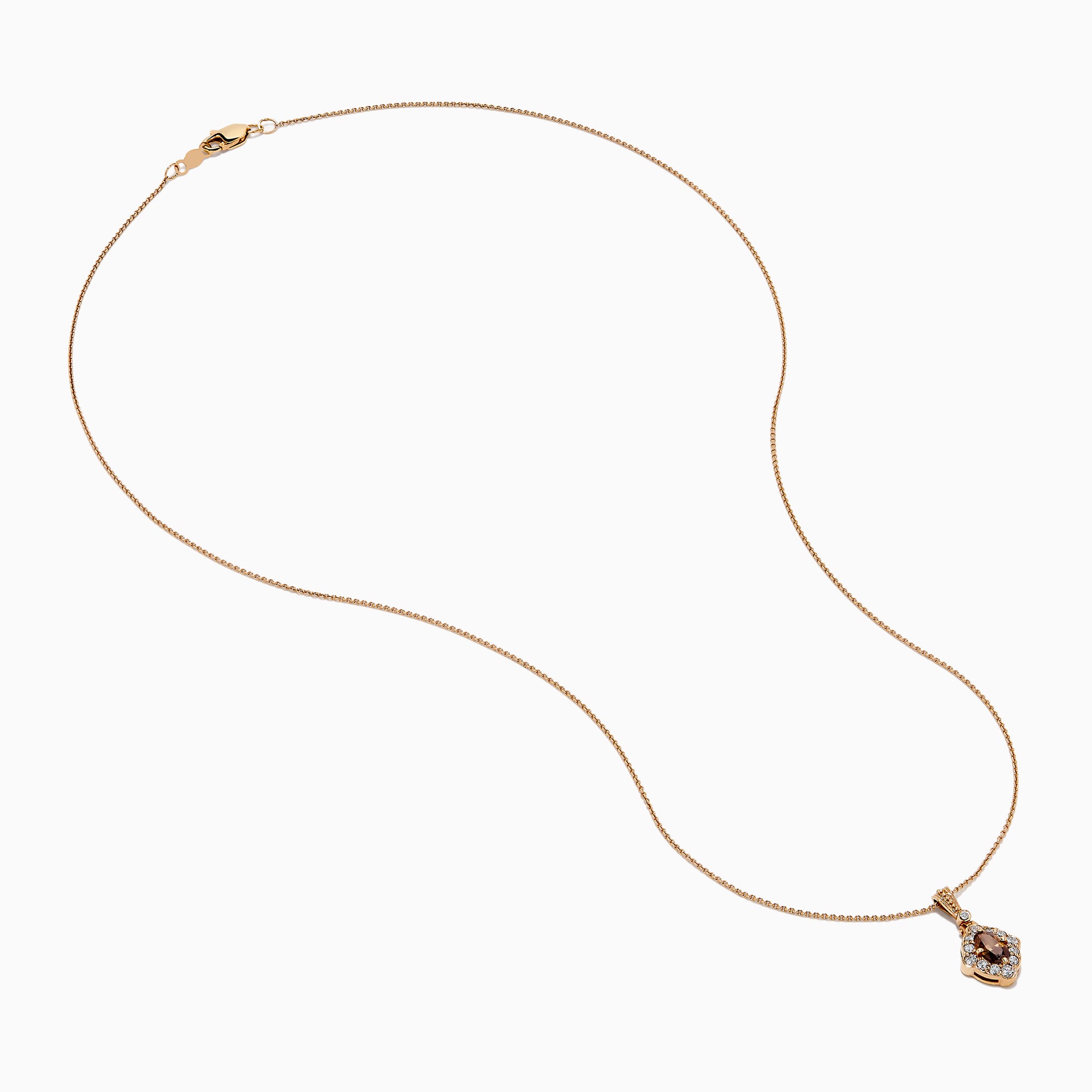 The 14K Rose Gold Brown and White Diamond Halo Pendant features an oval brown and white diamond surrounded by small clear stones in a decorative setting.