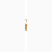 The 14K Rose Gold Brown and White Diamond Halo Pendant features an oval brown and white diamond surrounded by small clear stones in a decorative setting.