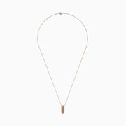 The Espresso 14K Two Tone Gold Pendant showcases brown and white diamonds in a vertical design, set on a delicate gold chain for a refined, elegant touch.